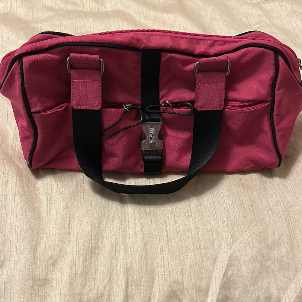 Kenneth Cole Reaction barrel bag.